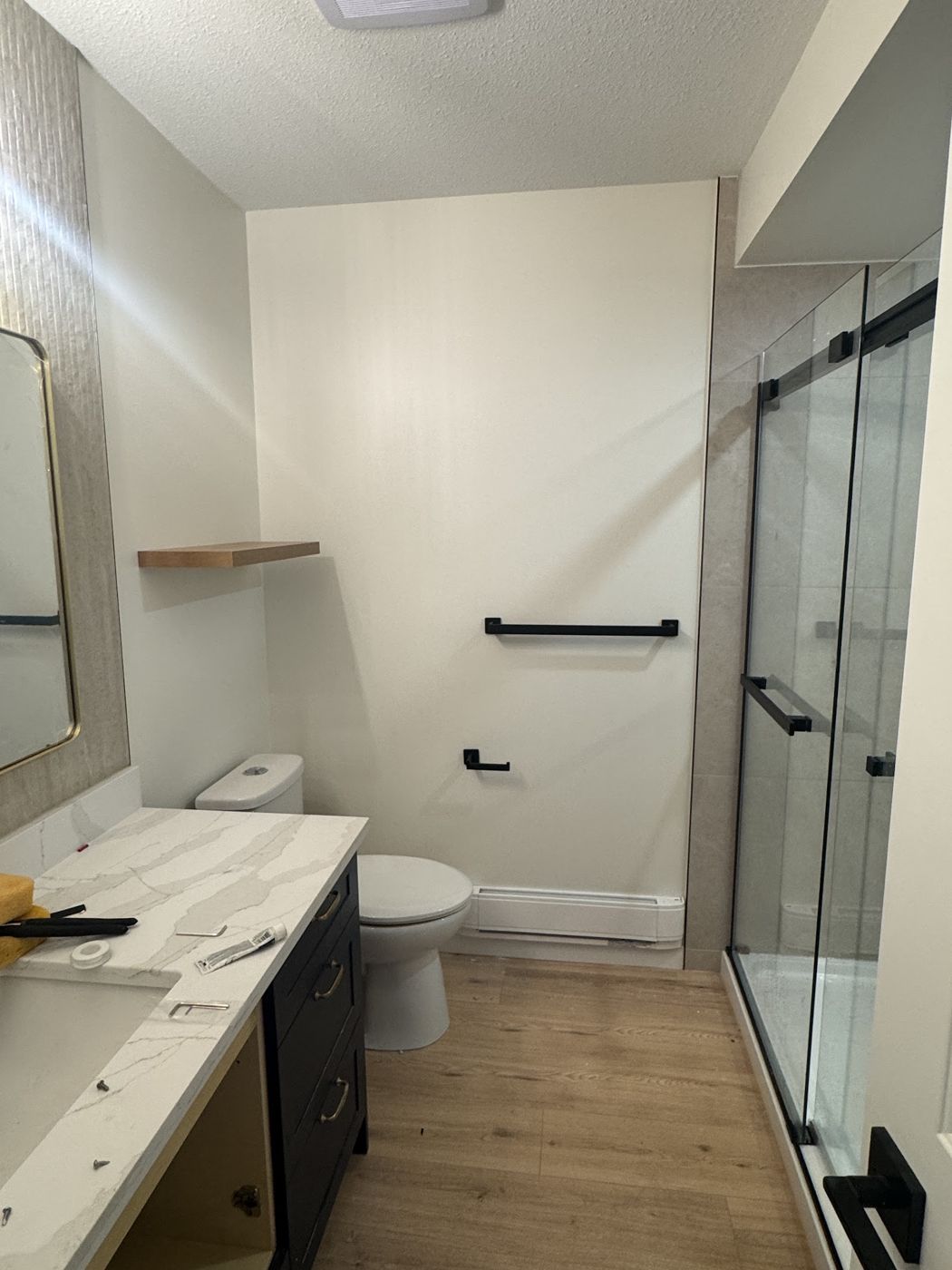 Bathroom renovation with glass shower and new vanity